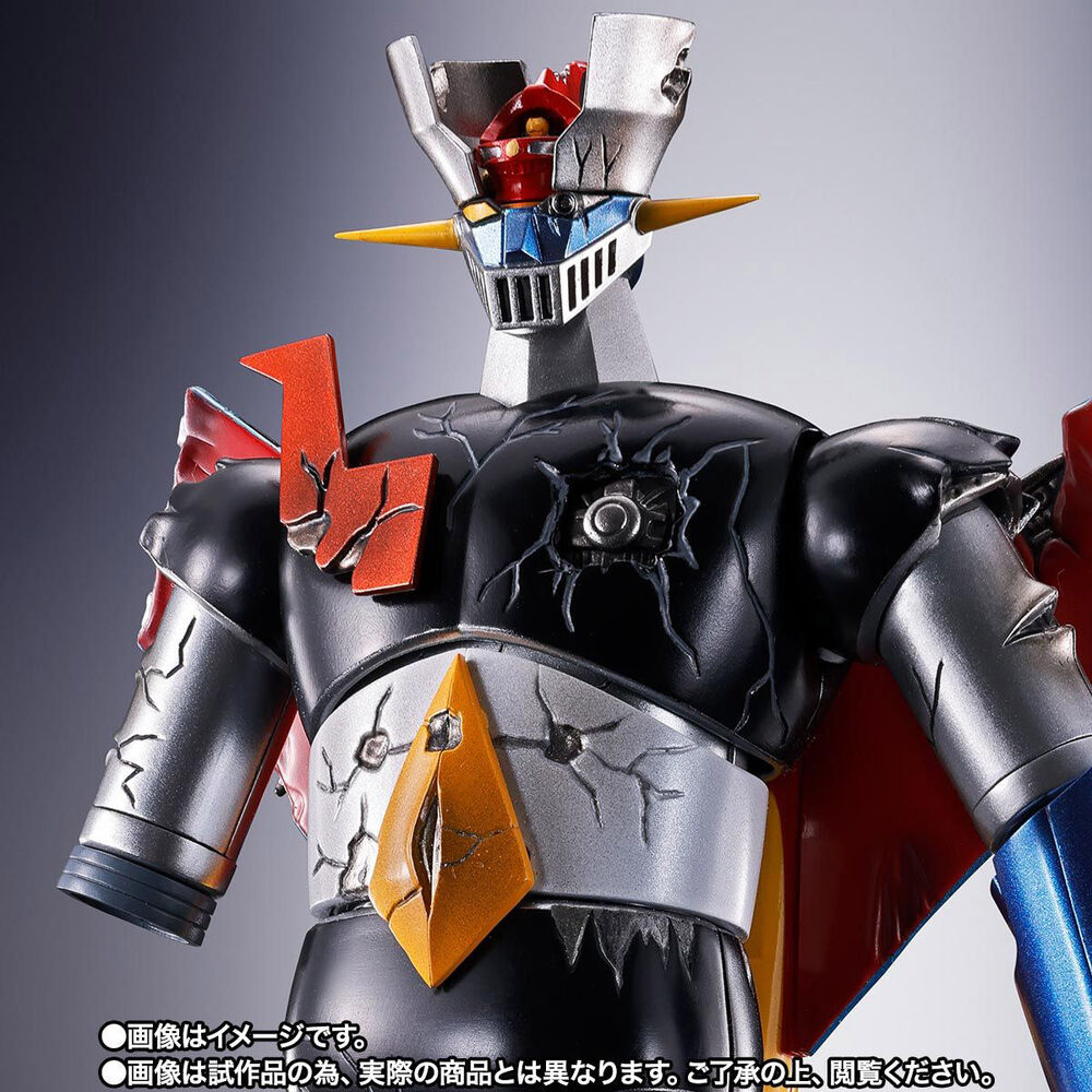 figura de mazinger z dañado